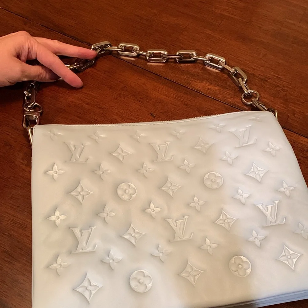 Authentic Brand new Louis Vuitton baby blue color Embossed Leather Chain purse.